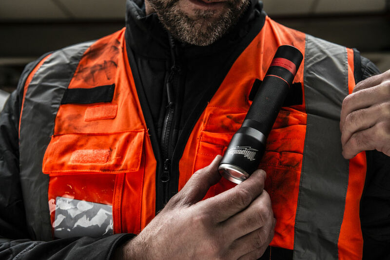 MILWAUKEE Reflexná vesta PREMIUM Hi-VISIBLE oranžová S/M